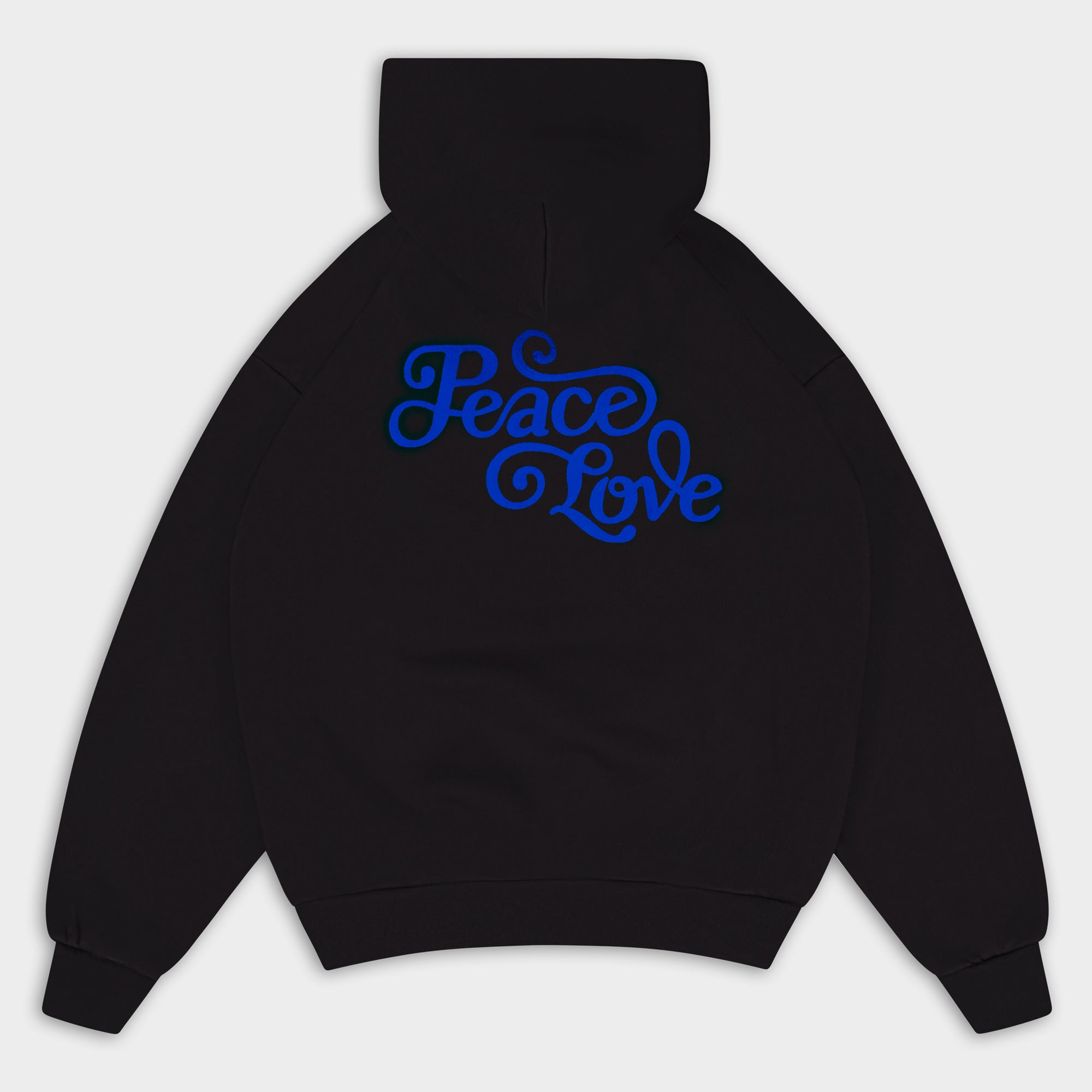 Flat Lay of Black hoodie with 'Peace Love' text in blue on a light gray background