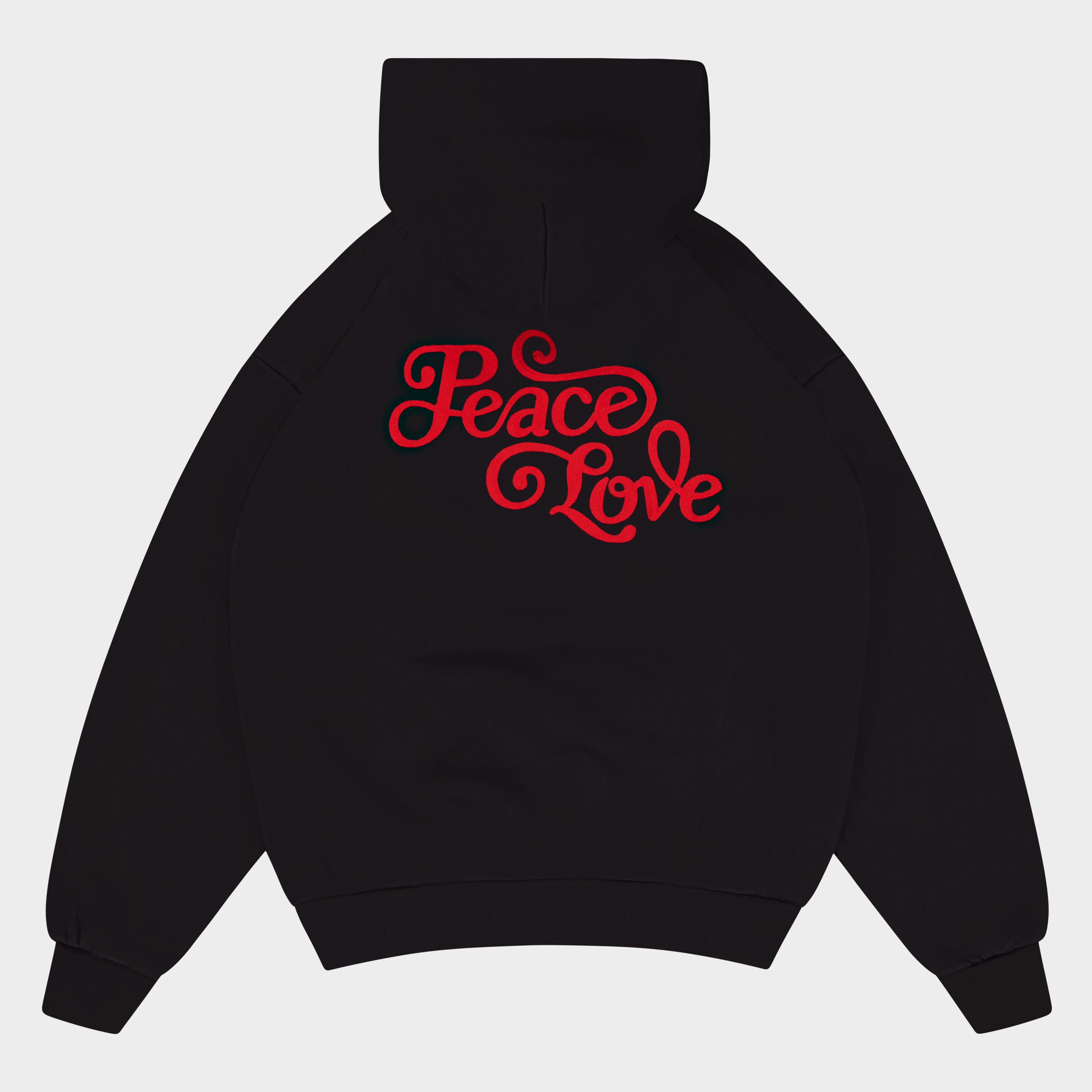 Flat Lay of Black hoodie with 'Peace Love' text in red on a light gray background