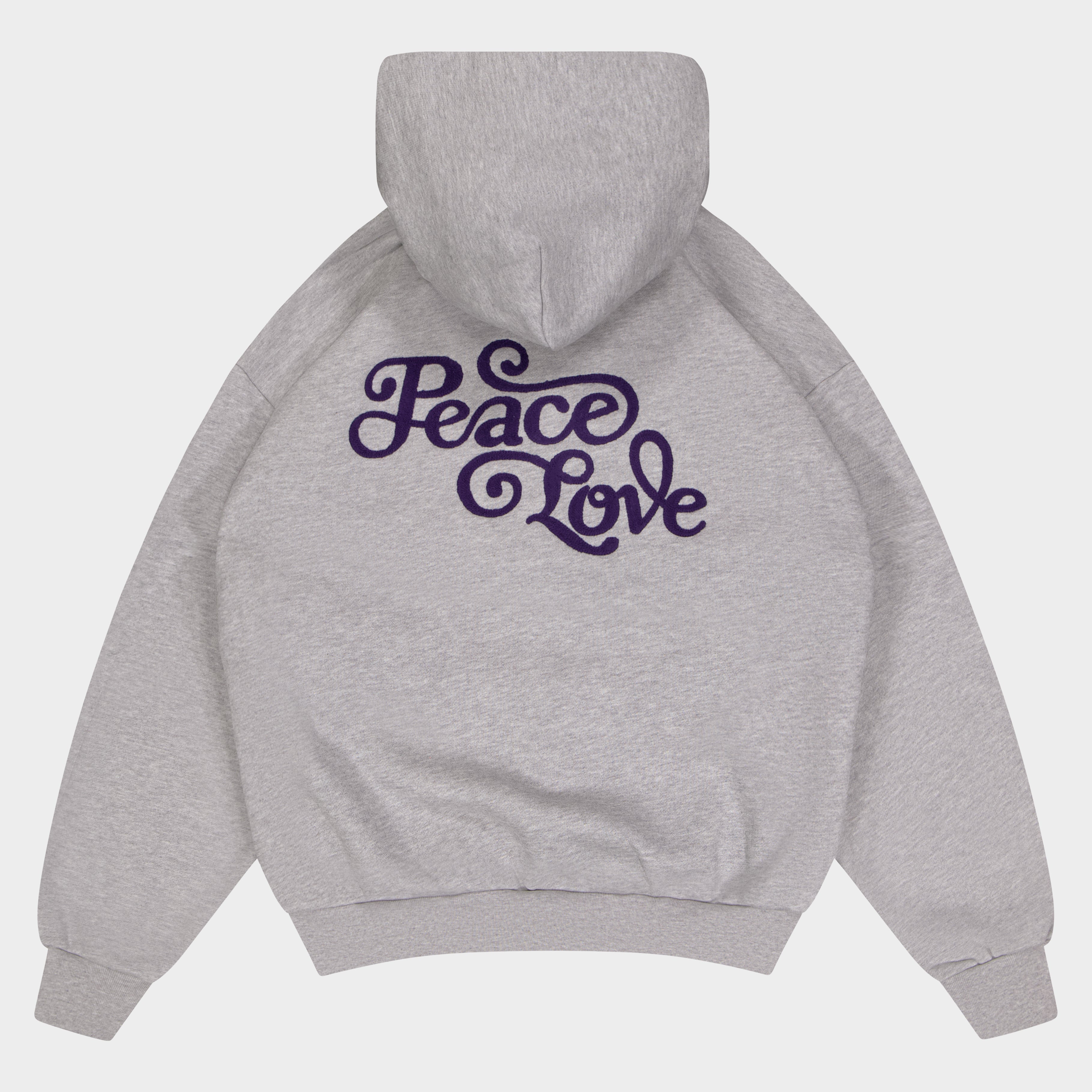 Flat Lay of Gray hoodie with 'Peace Love' text on the back against a light gray background