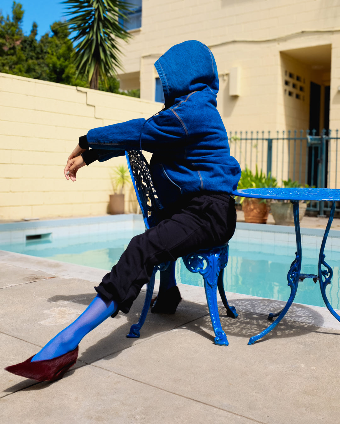 Woman Wearing Sociea Anonima Denim Hoodie