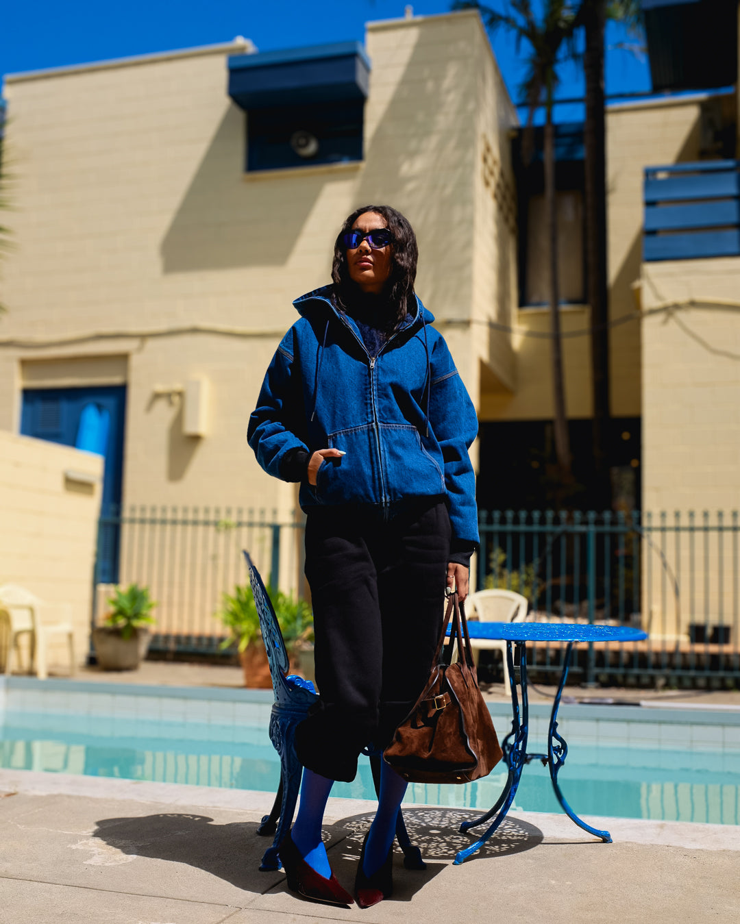 Woman Wearing Sociea Anonima Denim Hoodie