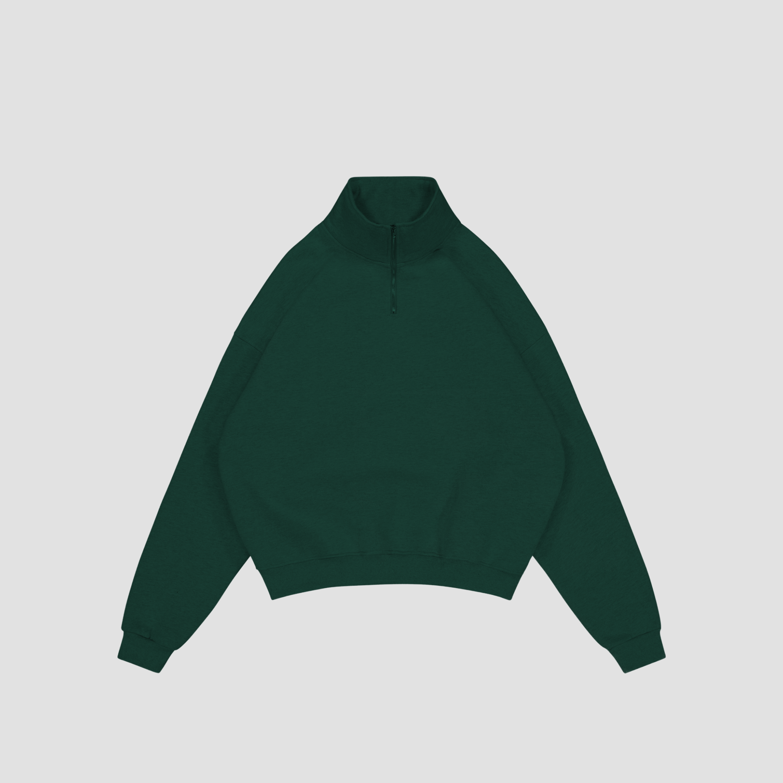 Flat lay of British racing green quarter-zip sweatshirt on a light gray background