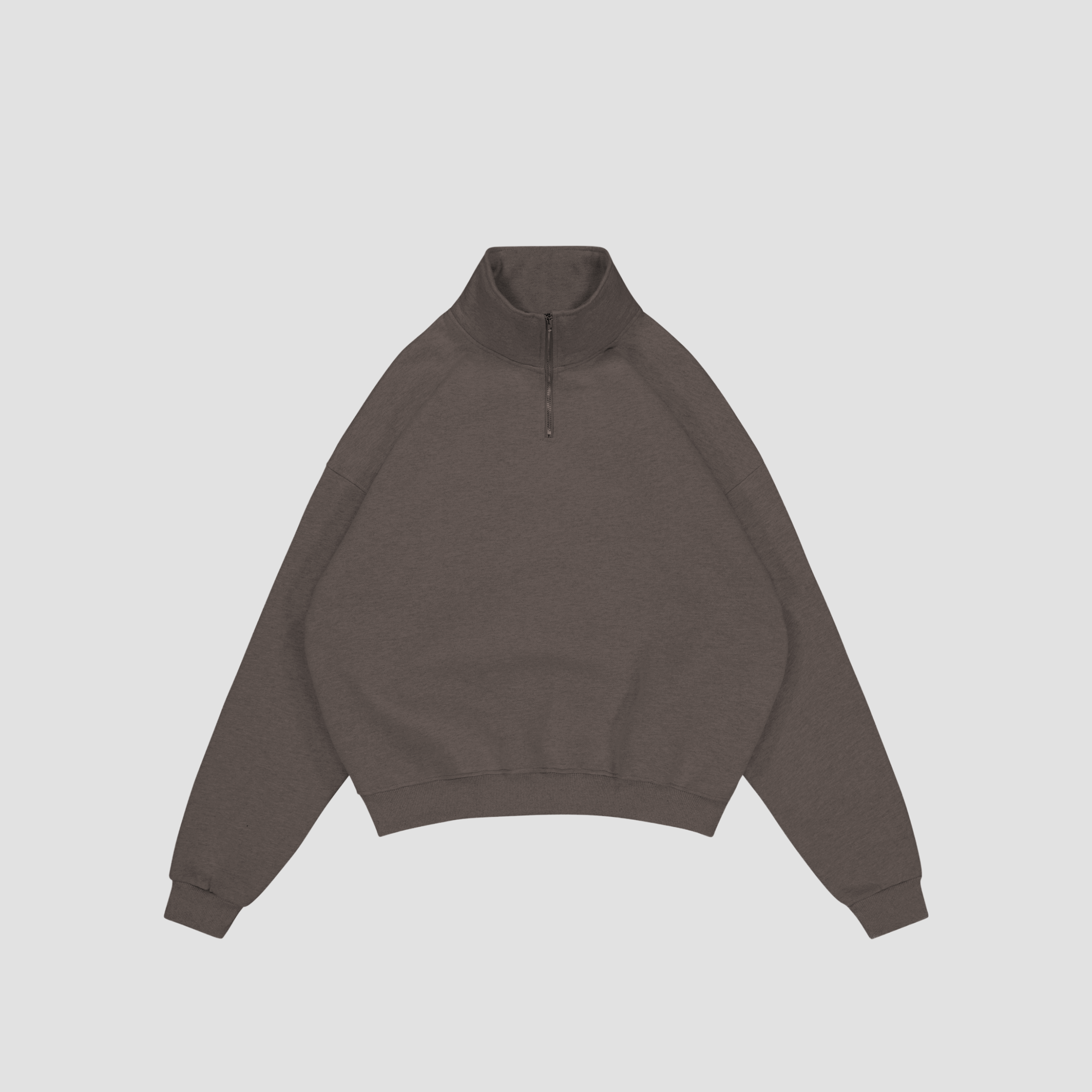 Flay lay of shadow grey quarter-zip sweatshirt on a light gray background