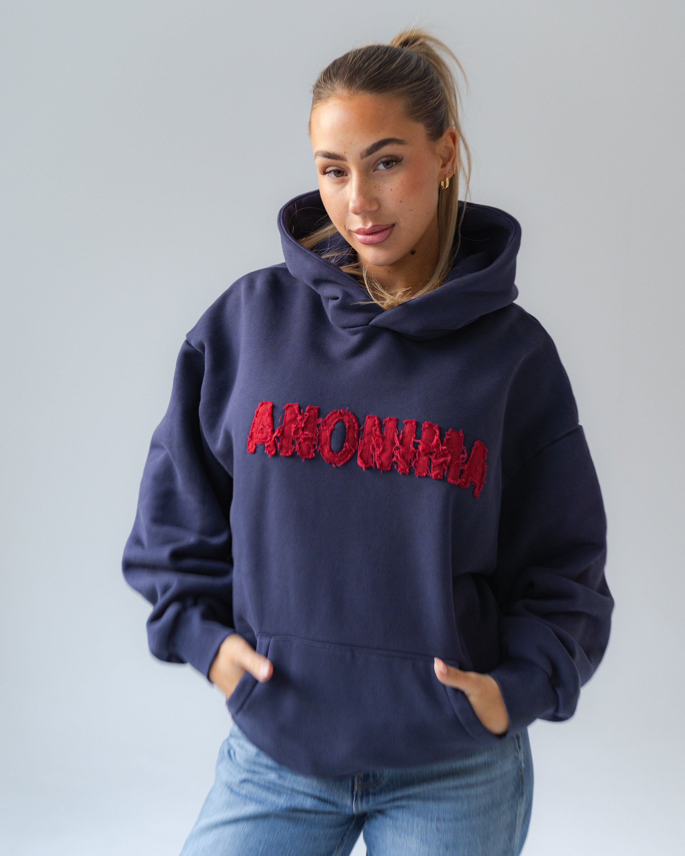 Navy Blue Anonima Hoodie with red appliquè