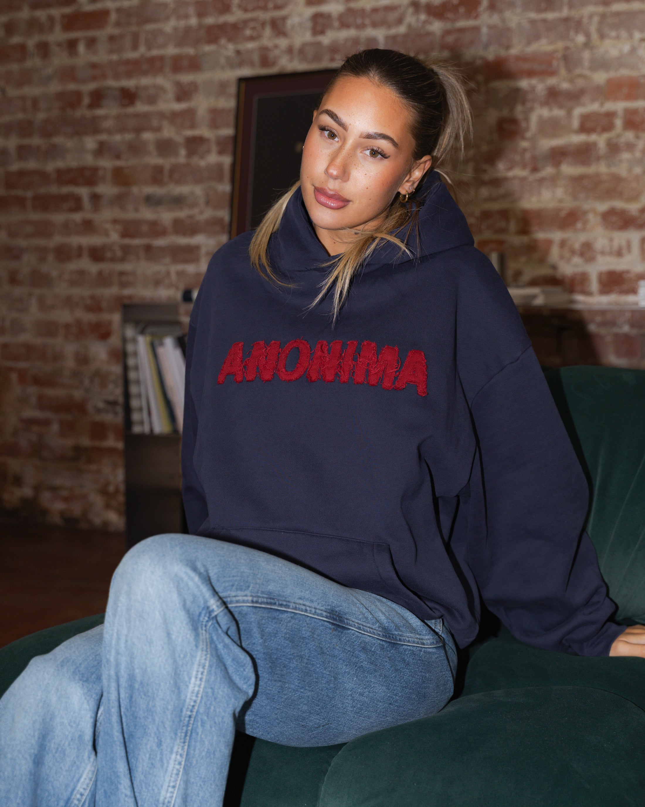 Navy Blue Anonima Hoodie with red appliquè